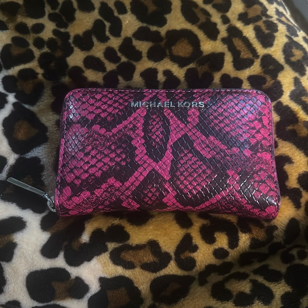 Snake skin colored pink and black card case